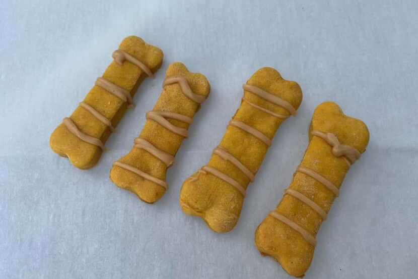 Maggie's Barkery sells pumpkin-peanut butter biscuits with a bacon and peanut butter drizzle.