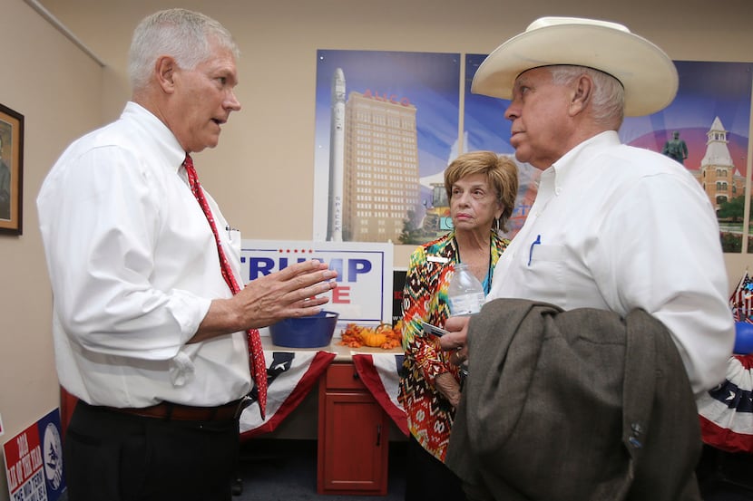 Former U.S. Rep. Pete Sessions (left) speaks to Jon R. Ker, chairman of the McLennan County...