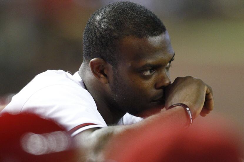 Arizona Diamondbacks Justin Upton watches the game from the bench against the San Diego...