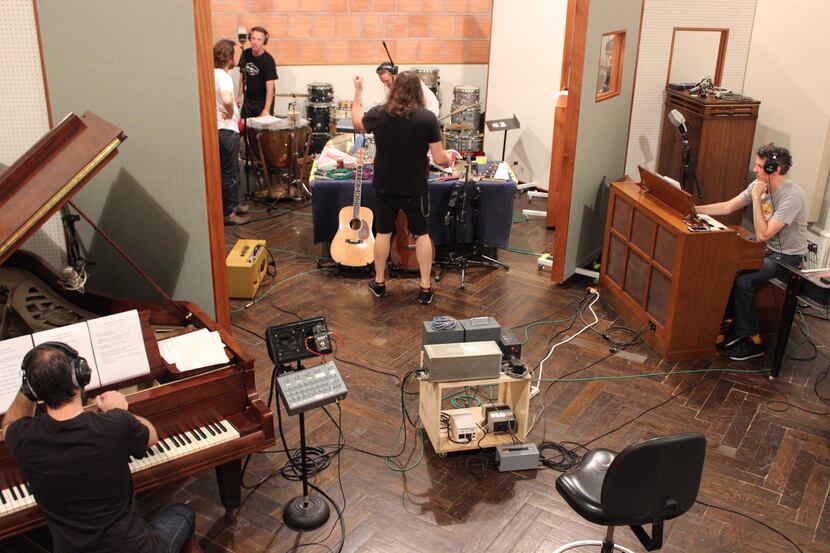 Dylan Silvers (center) in Niles City Sound studio in Fort Worth recording 'Beach Boy in...