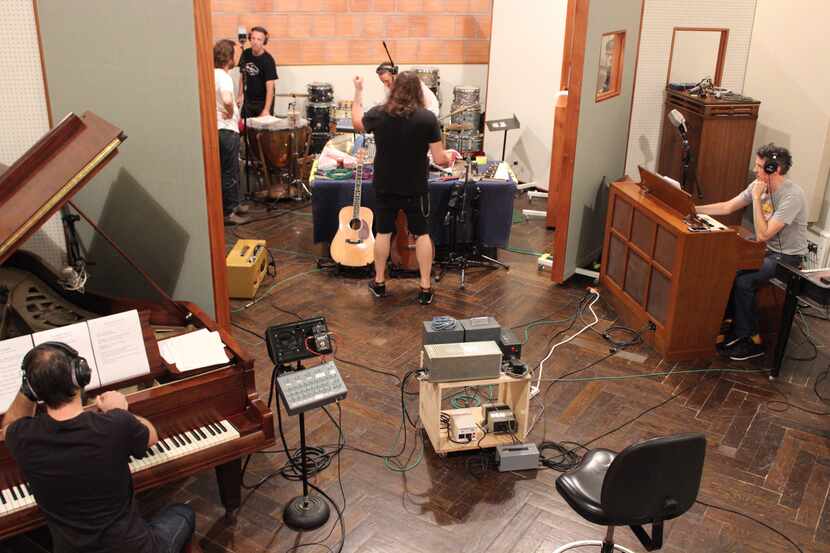 Dylan Silvers (center) in Niles City Sound studio in Fort Worth recording 'Beach Boy in...