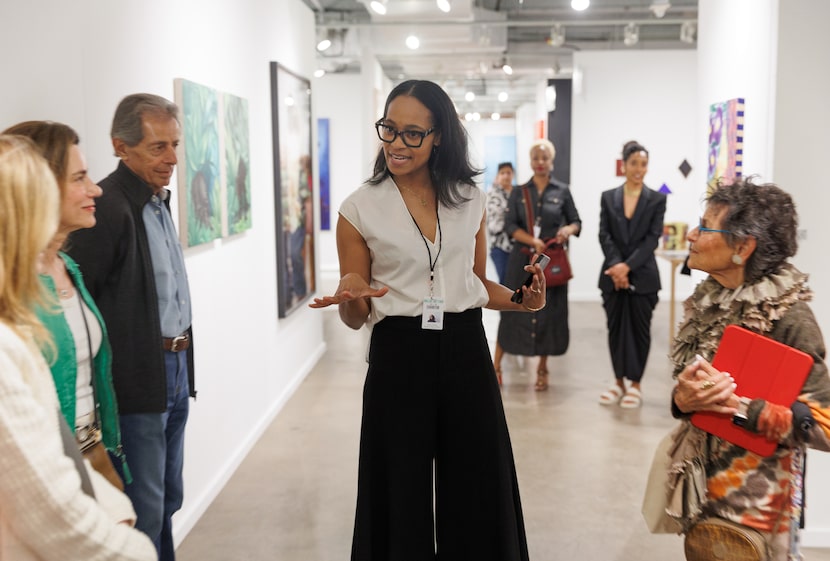 Valerie Gillespie talks about her gallery Pencil on Paper to a tour group with Gail Sachson...