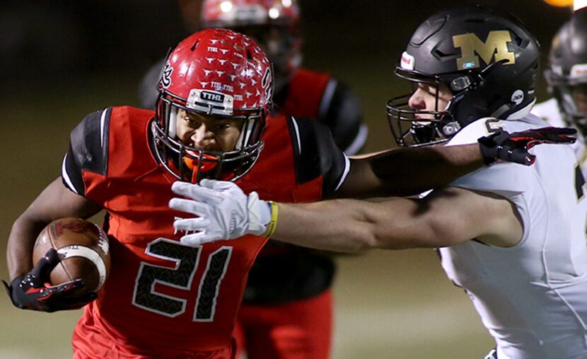 Cedar Hill's Marquise Forman, 21, against Mansfield's Corbin Fredrick, 2,  during...