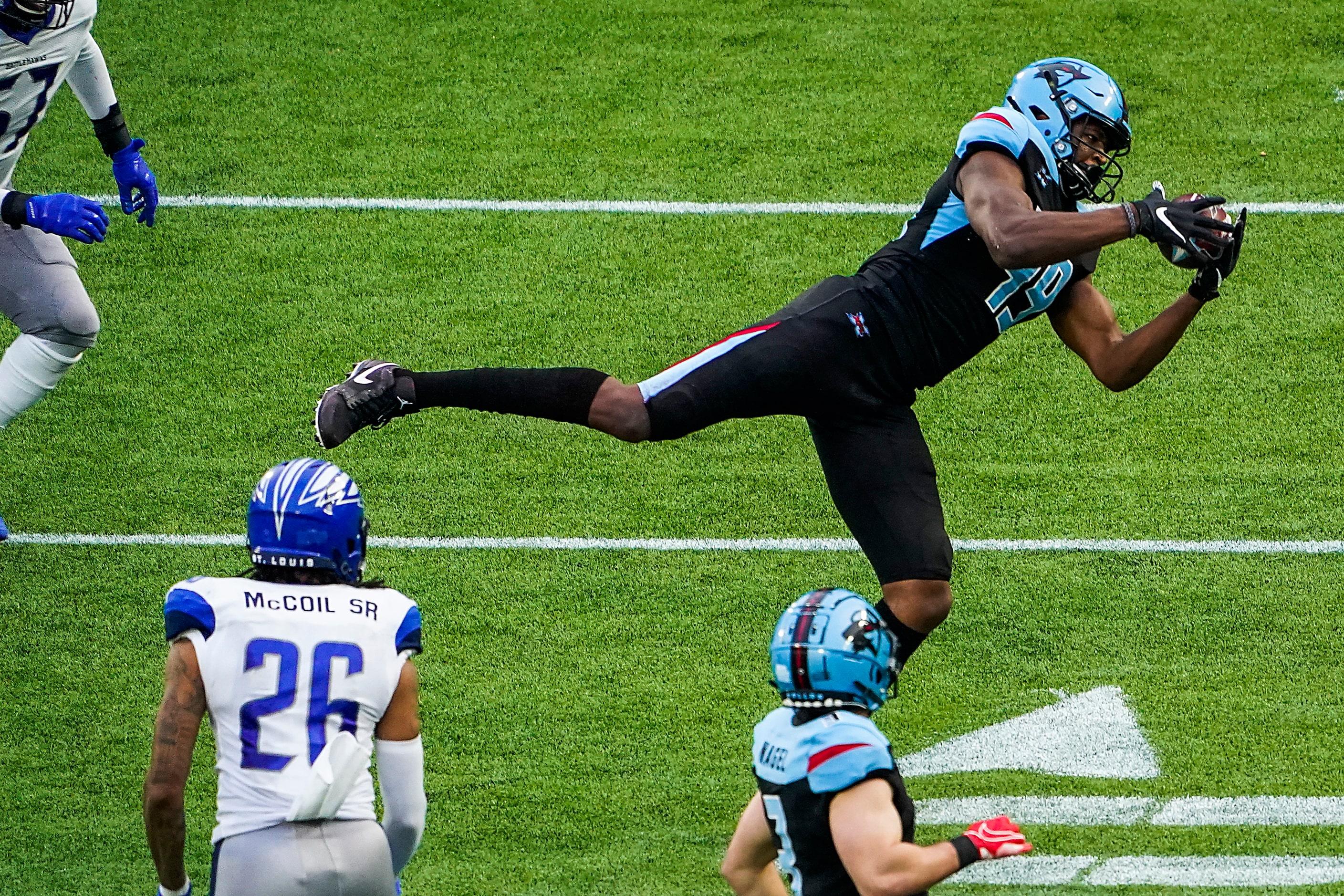 Dallas Renegades tight end Donald Parham (49) makes a catch in front of St. Louis...