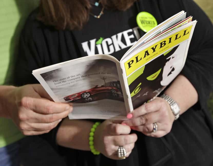 
Steve Hanebutt (left) and Kimberly Hanebutt show off their Wicked memorabilia at their home...