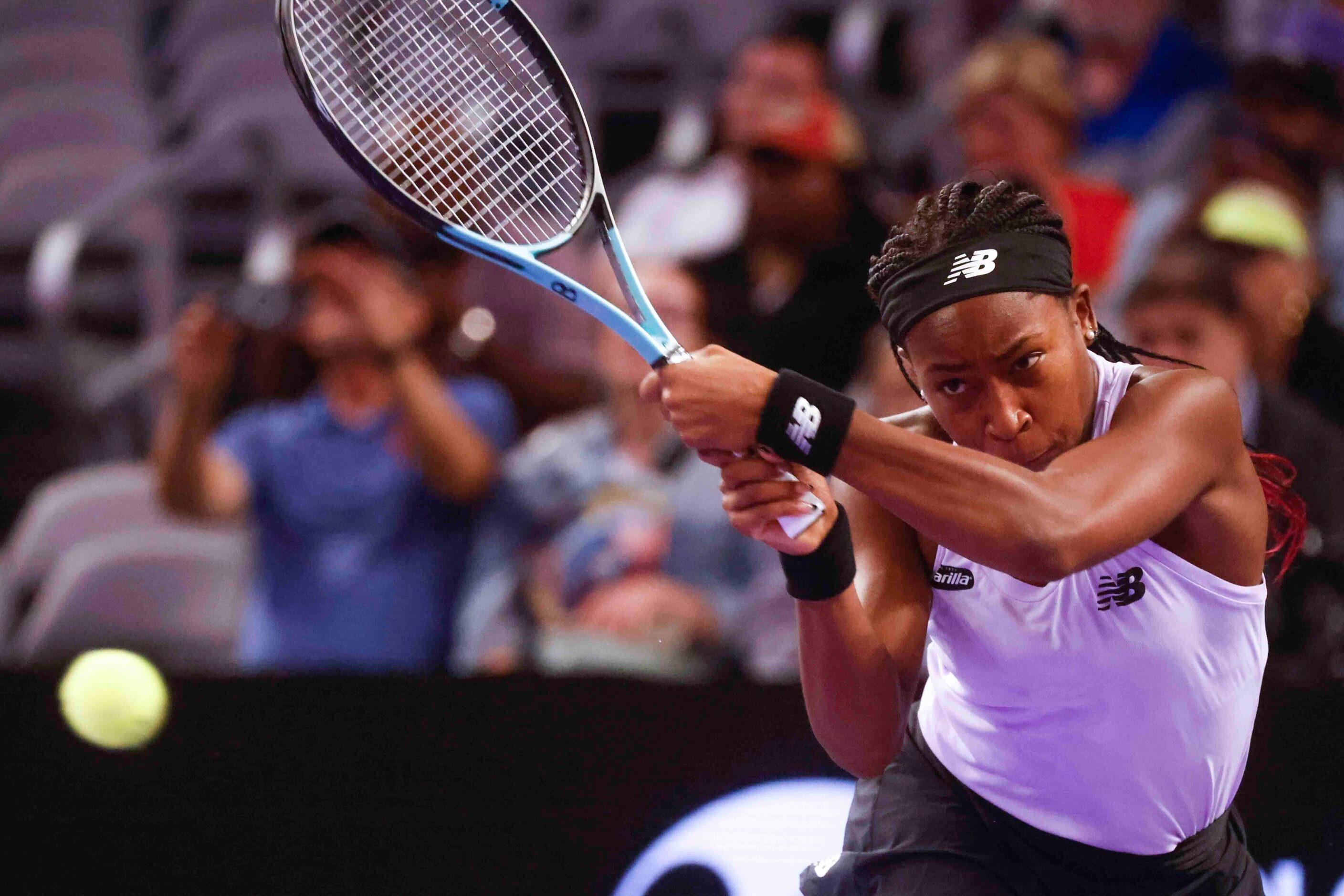 Coco Gauff of the USA returns a shot against Caroline Garcia of France on day two of the WTA...