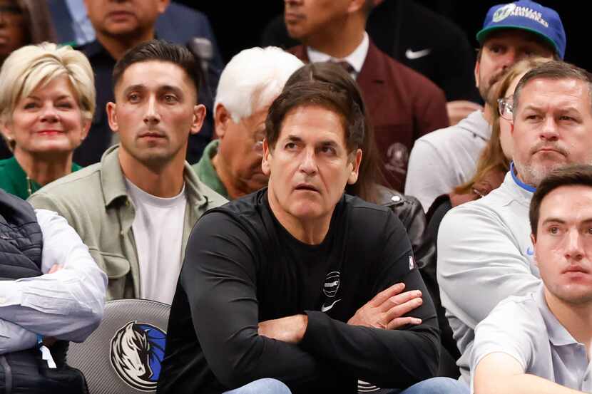 Dallas Mavericks minority owner Mark Cuban remains on the sideline during the first half of...