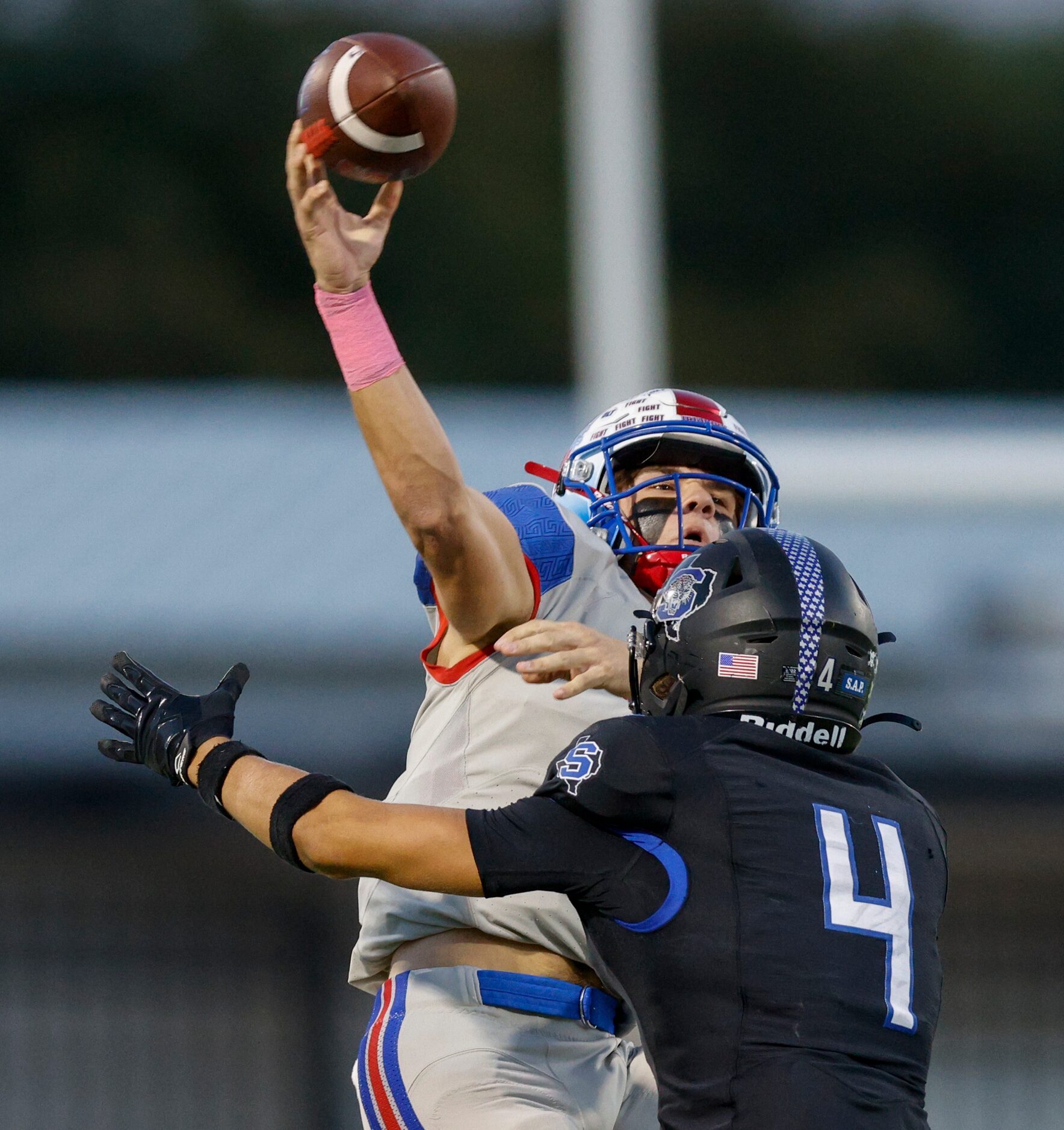 Midlothian Heritage quarterback Kaden Brown (2) throws a pass over Mansfield Summit...