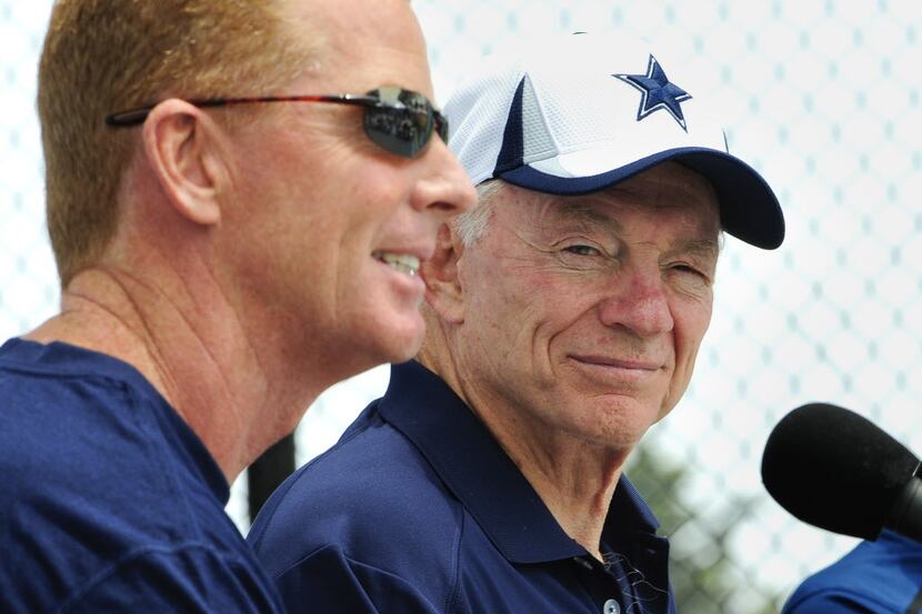 FILE - In this July 20, 2013, file photo, Dallas Cowboy owner Jerry Jones, right, looks on...