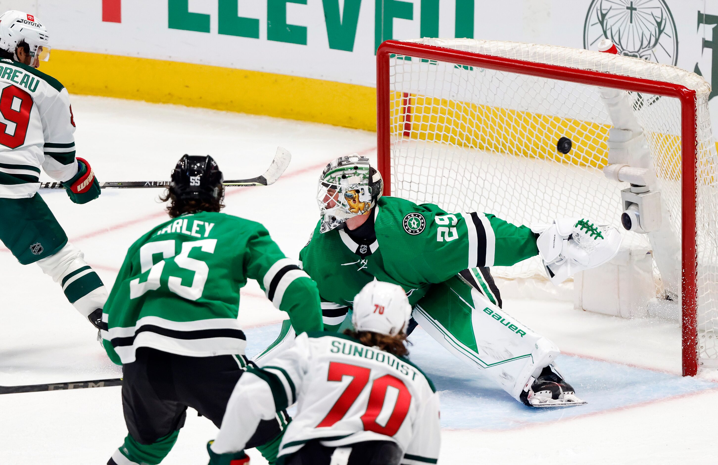 Dallas Stars goaltender Jake Oettinger (29) allows Minnesota Wild center Frederick Gaudreau...