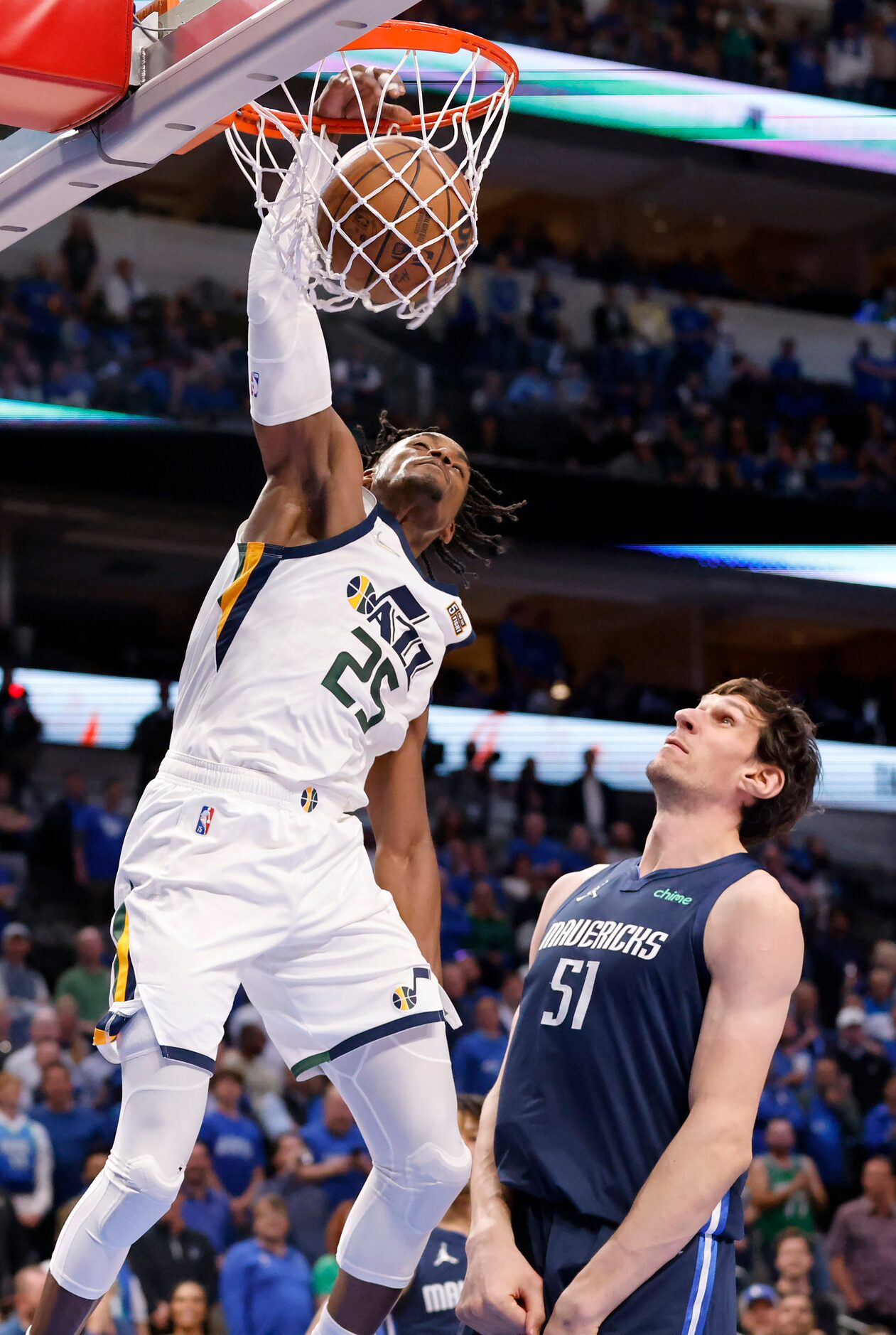 Utah Jazz forward Danuel House Jr. (25) dunks the ball over Dallas Mavericks center Boban...