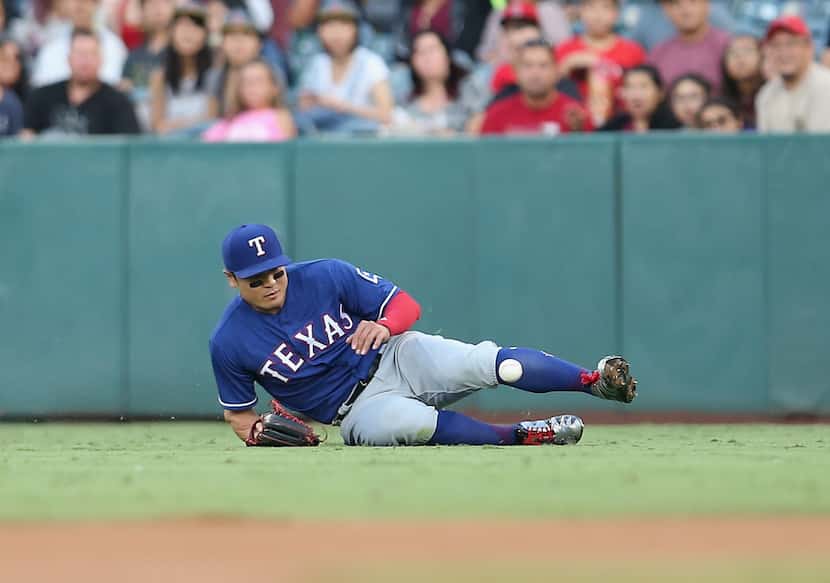 ANAHEIM, CA - SEPTEMBER 16:  Right fielder Shin-Soo Choo (#17) can't reach a first-inning...