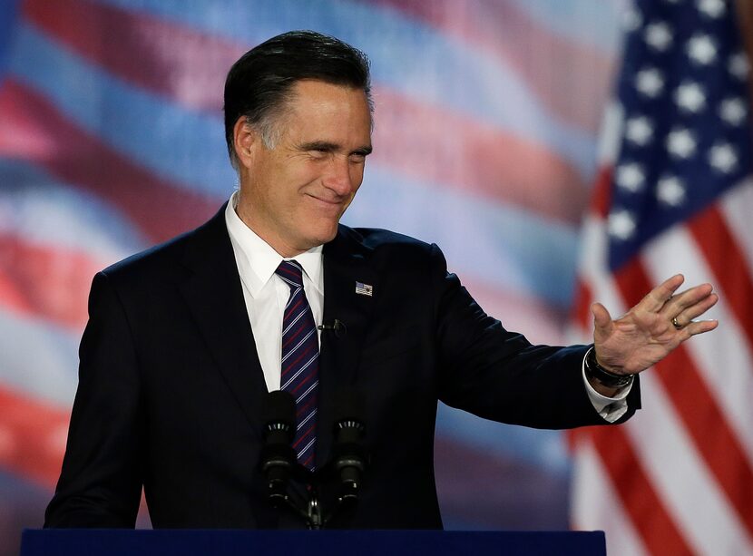 Republican presidential candidate and former Massachusetts Gov. Mitt Romney arrives to his...