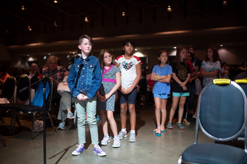 Kids line up to ask Raina Telgemeier questions at her 2019 National Book Festival appearance...