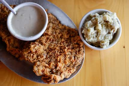 Chicken-fried steak comes in three sizes. Here's the giant "hoss," a crunchy, salty slab of...