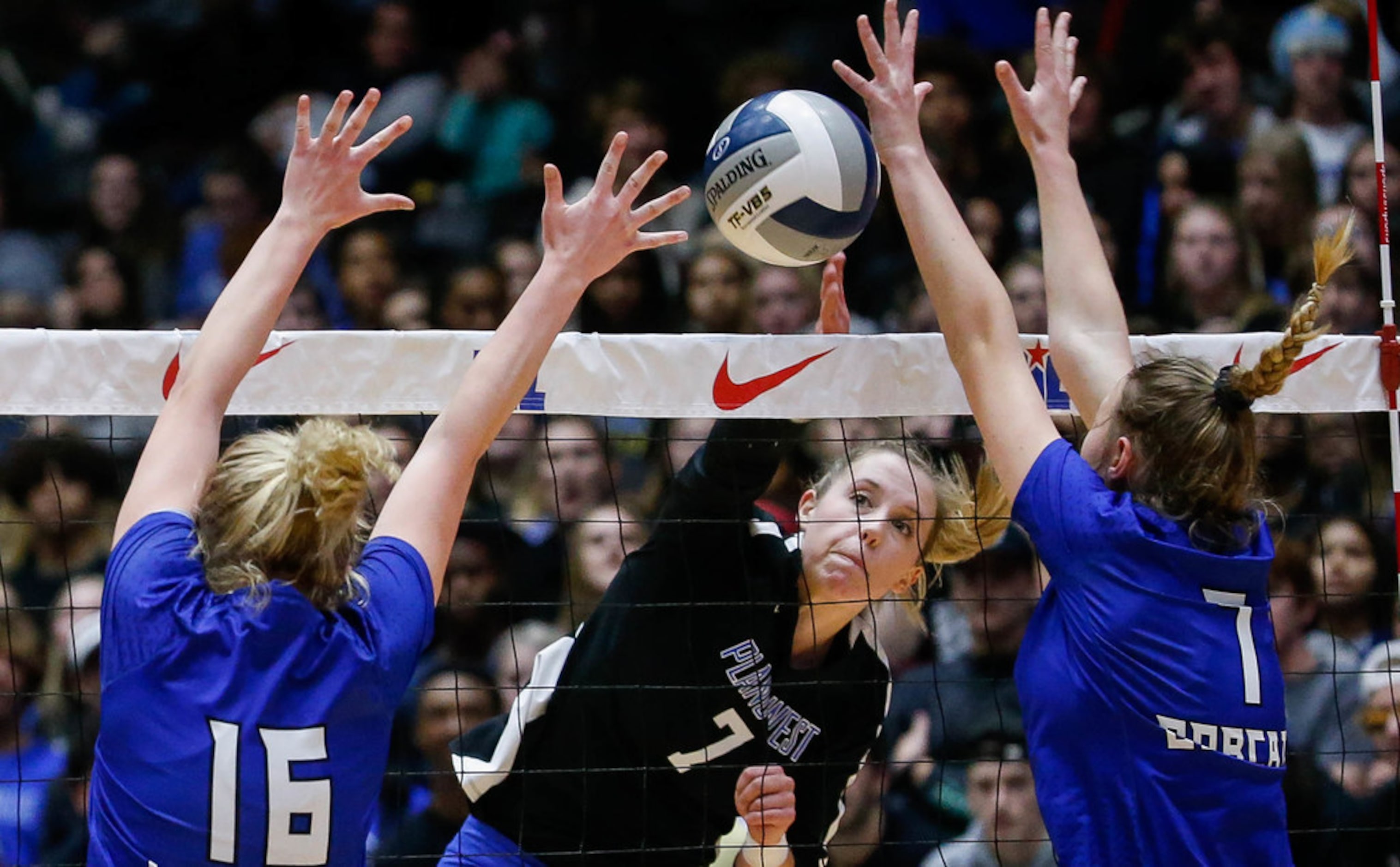 Plano WestÃs Jill Pressly (7) tips the ball over the net in the second set of a class 6A...