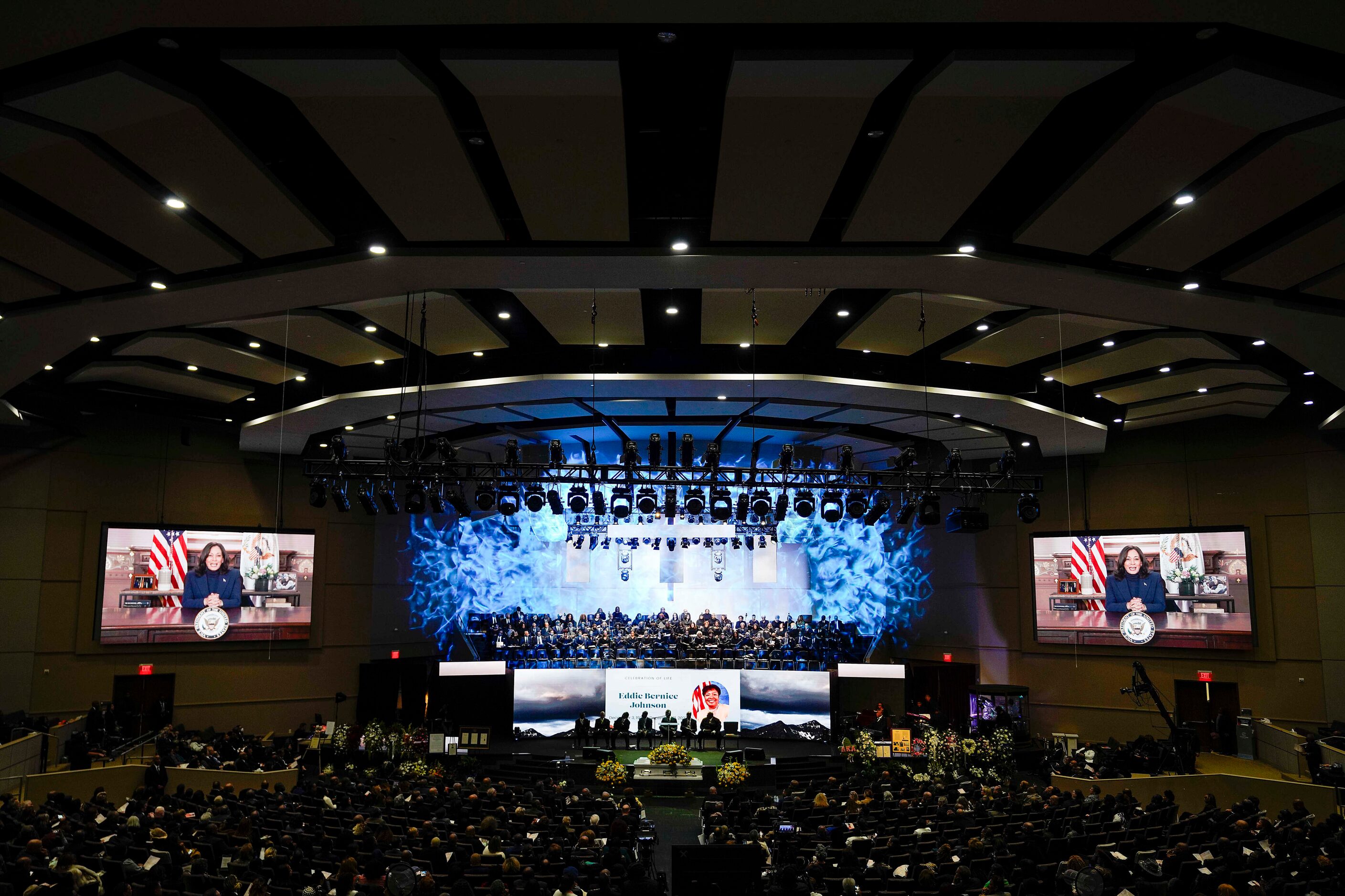 A video message from Vice President Kamala Harris is played during funeral services for...