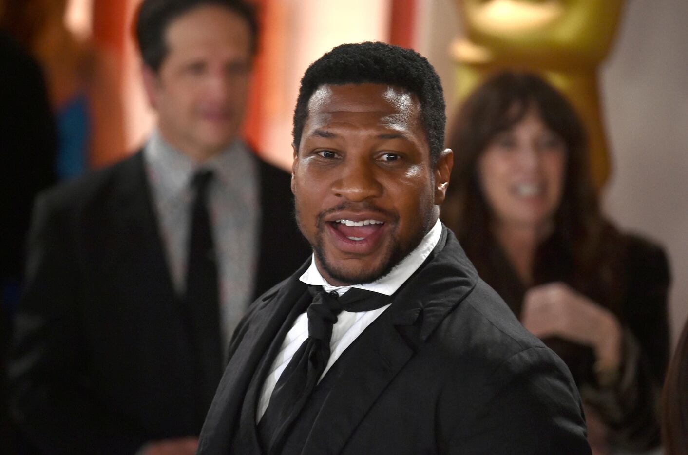Jonathan Majors arrives at the Oscars on Sunday, March 12, 2023, at the Dolby Theatre in Los...