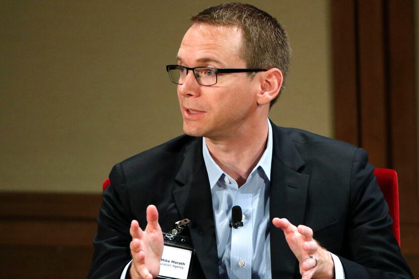 Mike Morath, commissioner of the Texas Education Agency, responds to a question during the...