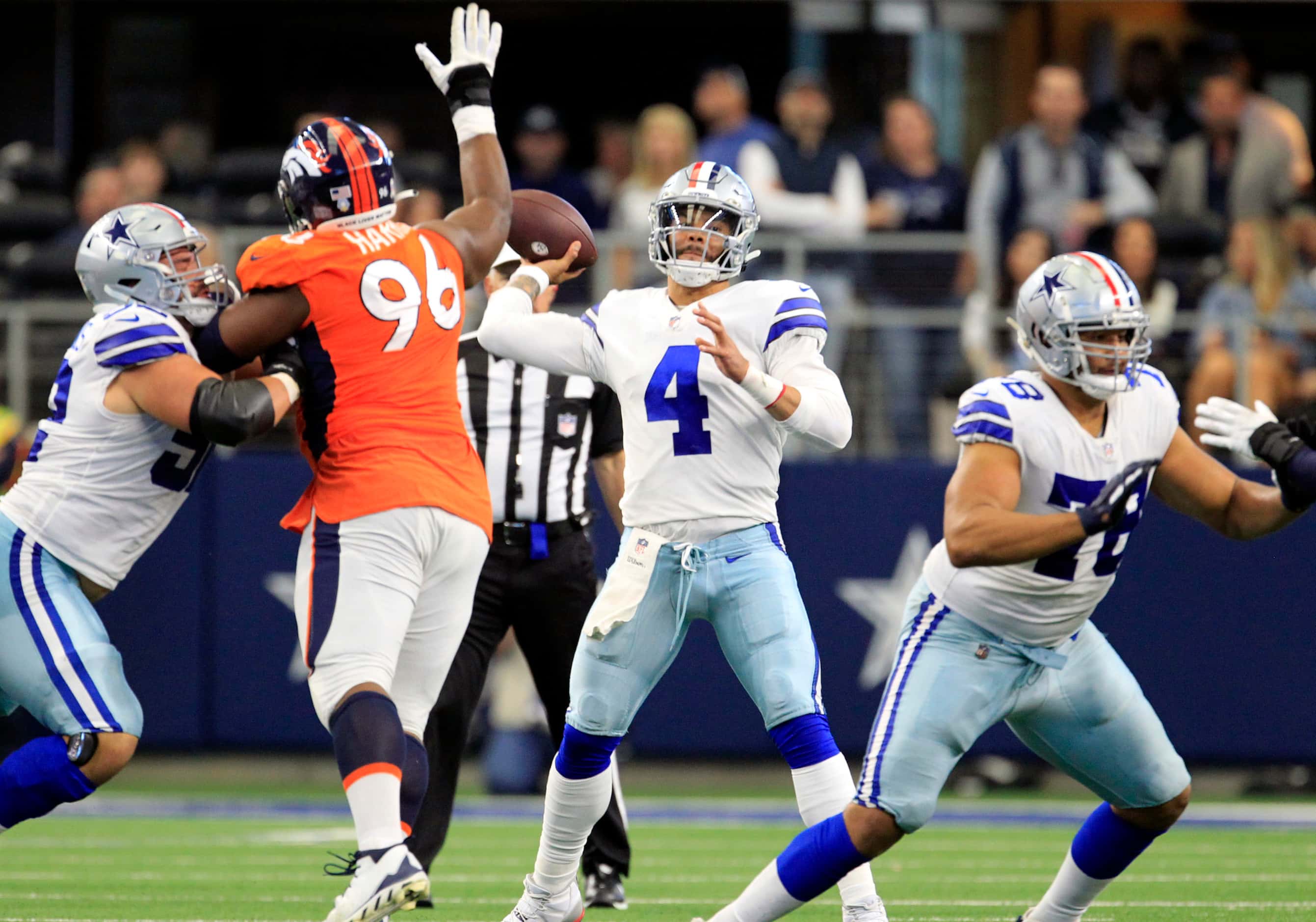 Dallas Cowboys quarterback Dak Prescott (4) throws a pass during the second half of a NFL...
