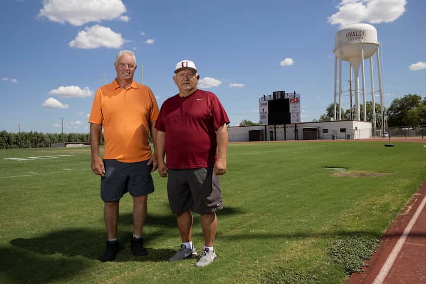 Former Uvalde football state champions Randy Gerdes (left) and Oscar Mireles pose for a...
