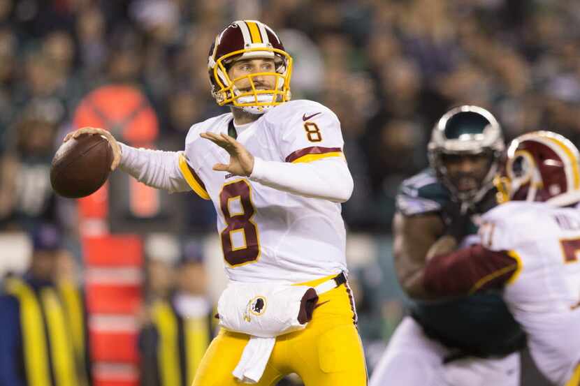 PHILADELPHIA, PA - DECEMBER 26: Kirk Cousins #8 of the Washington Redskins throws a pass in...