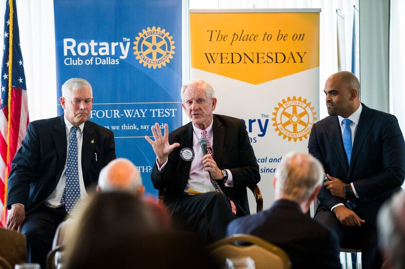 Congressional candidate Pete Sessions, left, debates Colin Allred, right, at a Rotary Club...