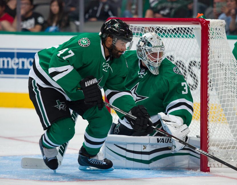 Sep 29, 2015; Dallas, TX, USA; Dallas Stars defenseman Johnny Oduya (47) and goalie Antti...