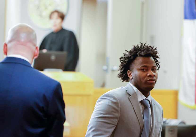 Darius Fields looks back as he leaves the courtroom after he was found guilty during a trial...