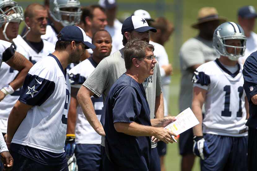 Dallas Cowboys Offensive Coordinator and OL coach Bill Callahan with Tony Romo (9) during...