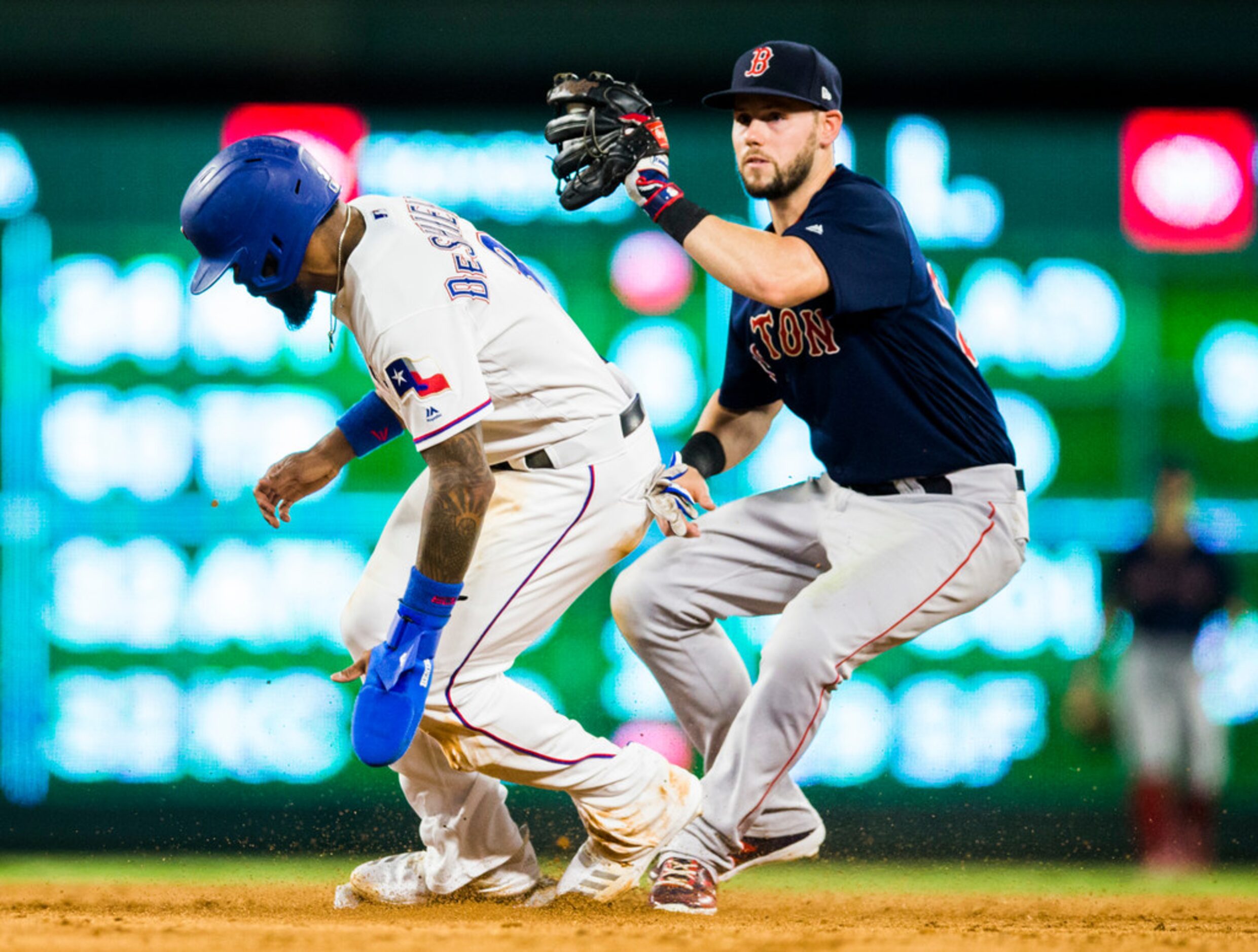 Texas Rangers center fielder Delino DeShields (3) makes it safely to second ahead of Boston...