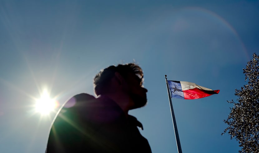 University of Texas at Austin student, Jose, poses for a portrait under the campus’ South...