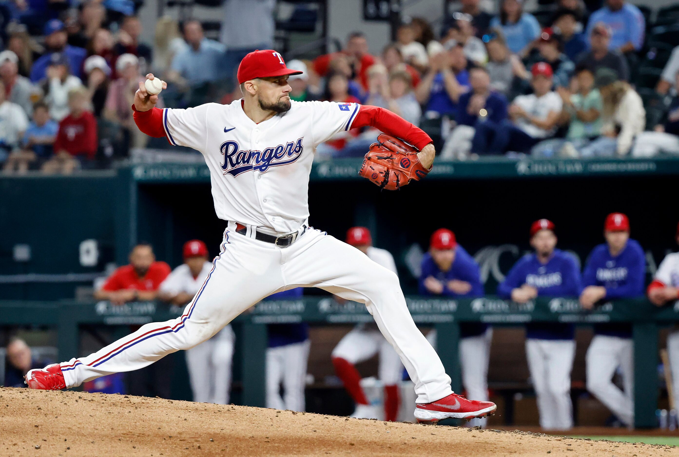 Texas Rangers starting pitcher Nathan Eovaldi (17) throws against the New York Yankees in...