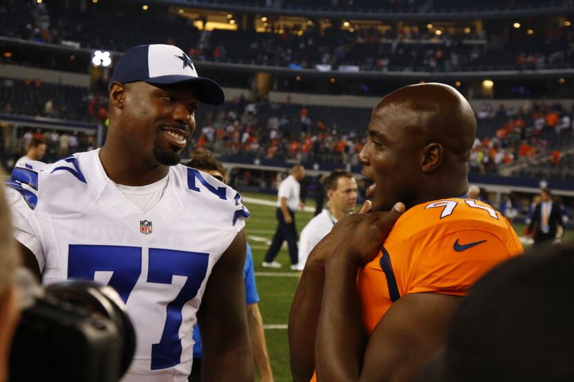 Former Dallas Cowboys Denver Broncos defensive end DeMarcus Ware (94) talks to Dallas...