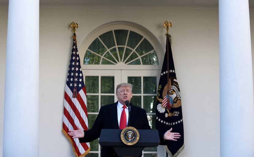 President Donald Trump makes a statement announcing that a deal has been reached to reopen...