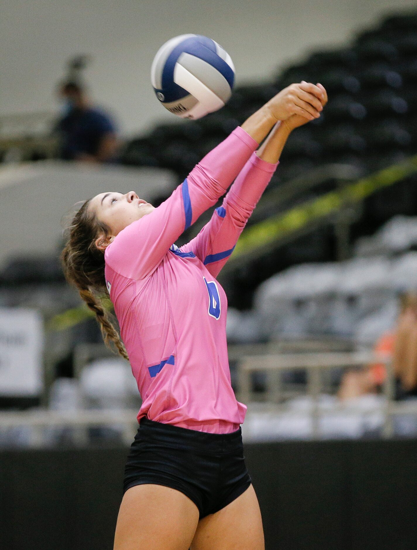 LindaleÕs Marleigh Thurman (0) bumps the ball during a high school volleyball match against...