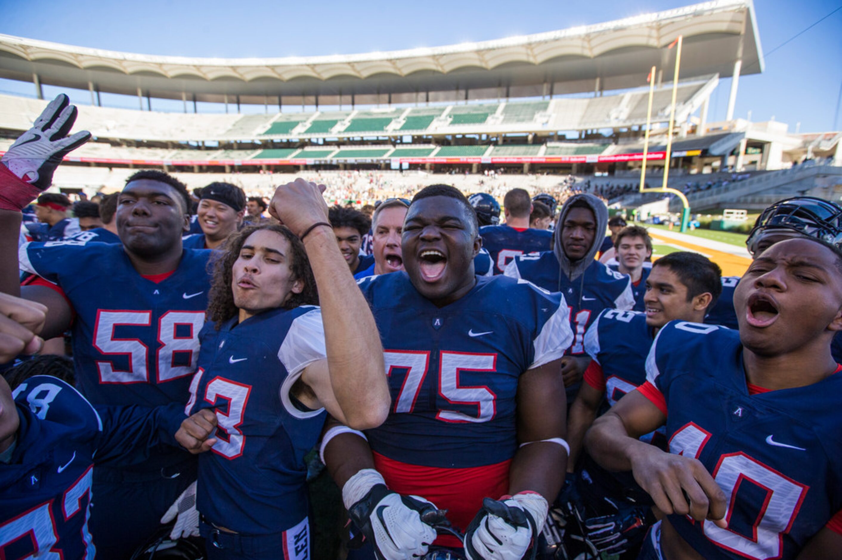 The Allen Eagles celebrate following their 31-24 win over The Woodlands in a Class 6A...