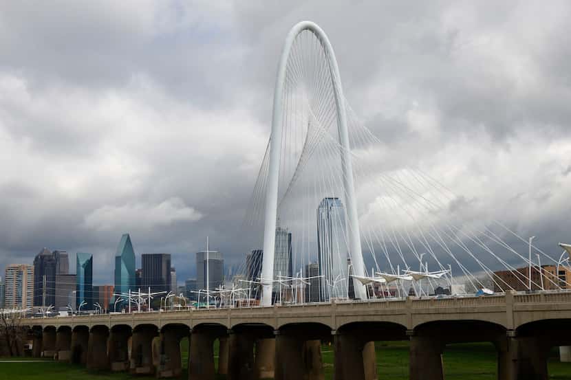 The Margaret Hunt Hill Bridge and the Dallas skyline are seen, Friday, March 22, 2024, in...