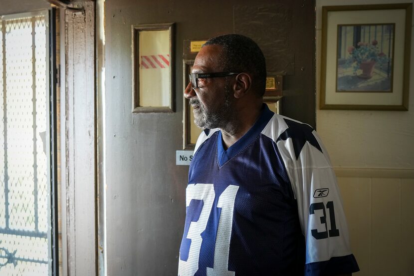 Roy Dunn looks outside the front door of the house where he rents a room on Tuesday, Aug....