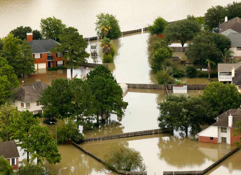 A West Houston, Texas neighborhood is flooded with rainwater, Wednesday, August 30, 2017. 