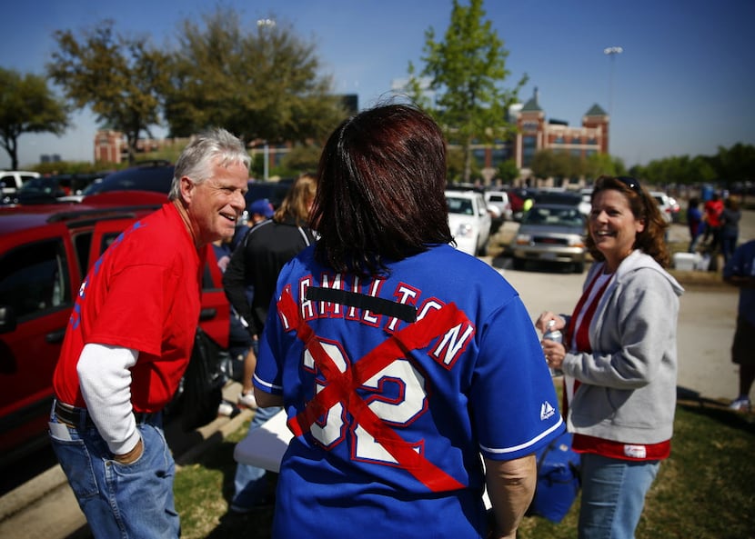 Texas Rangers fans Lisa Gilbert of Arlington wore her old Josh Hamilton jersey to protest...