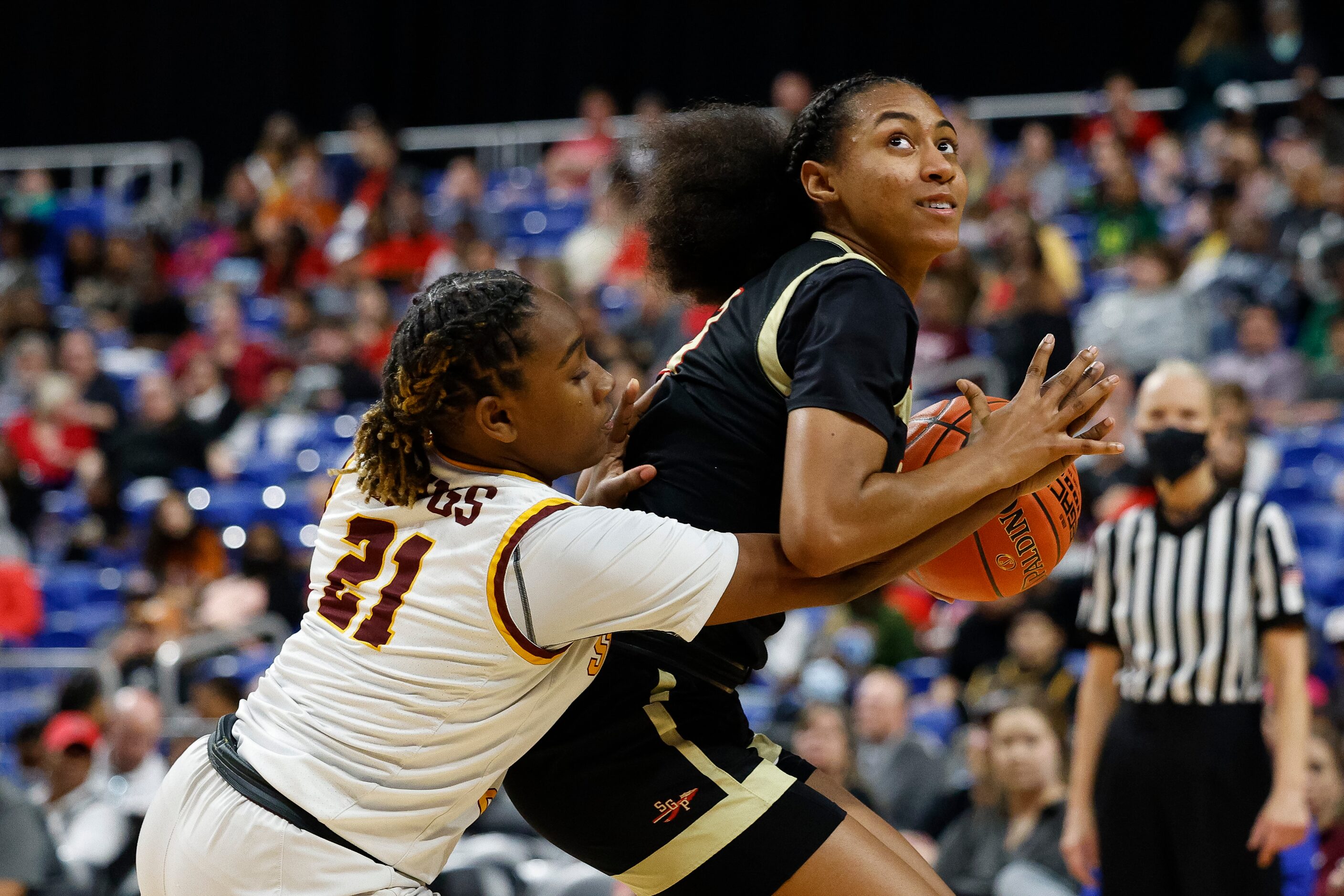 Humble Summer Creek guard Allison Reese (21) defends against South Grand Prairie guard...