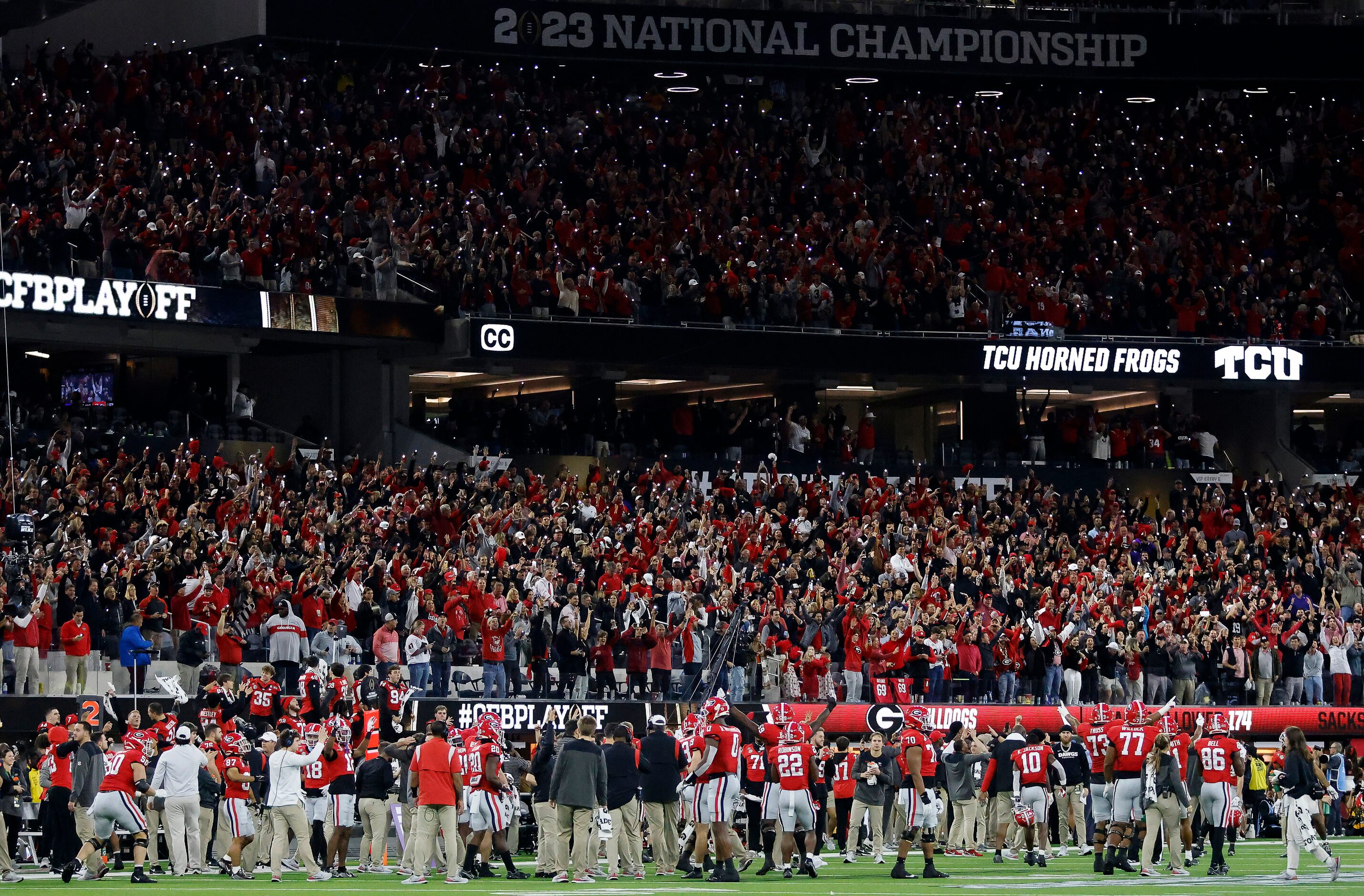 Georgia Bulldogs fans create a sea of light from their smartphones as the team called a...