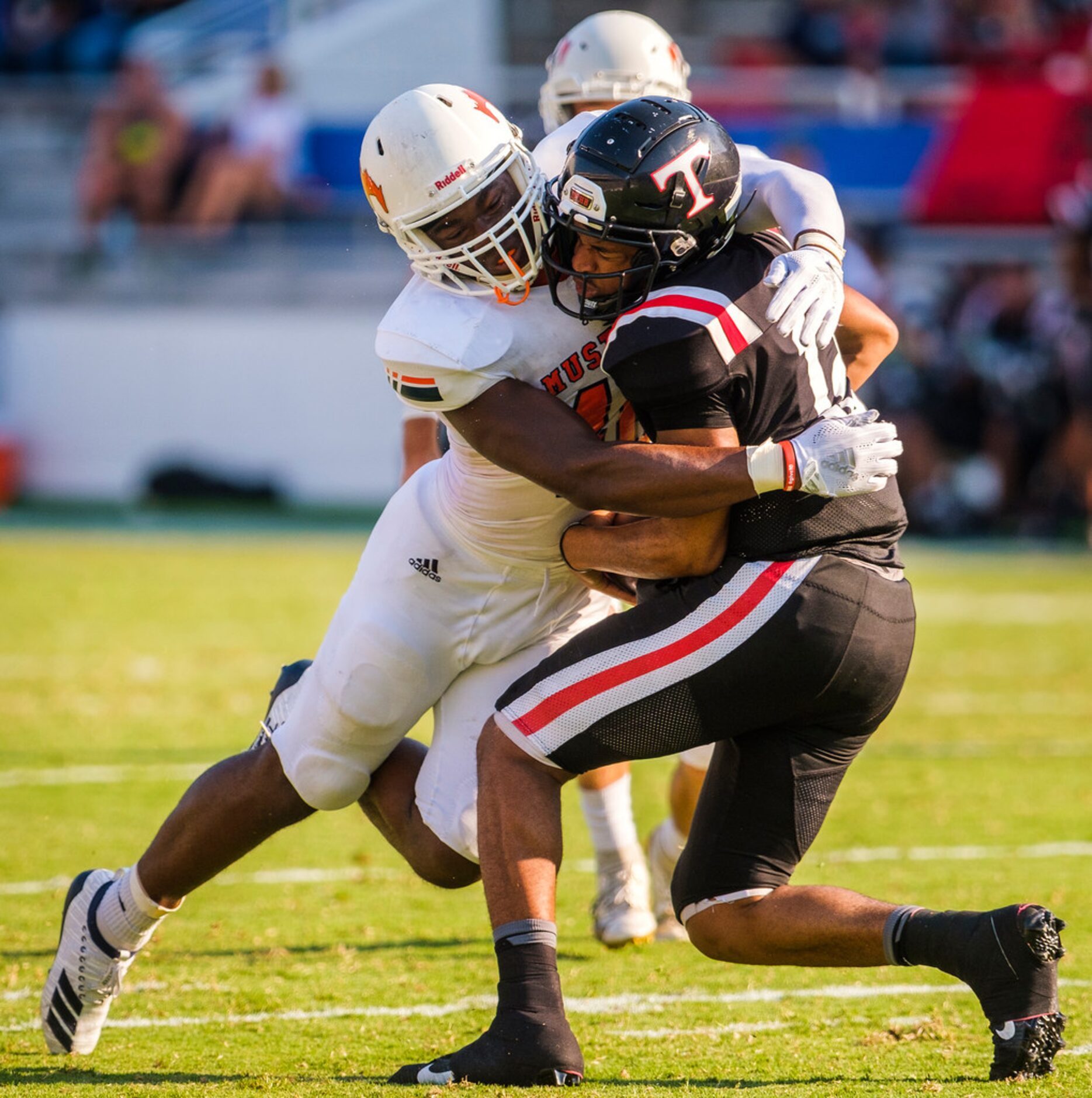 Sachse defensive lineman Anthony Anyanwu (46) sacks Euless Trinity quarterback Marcus Ervin...