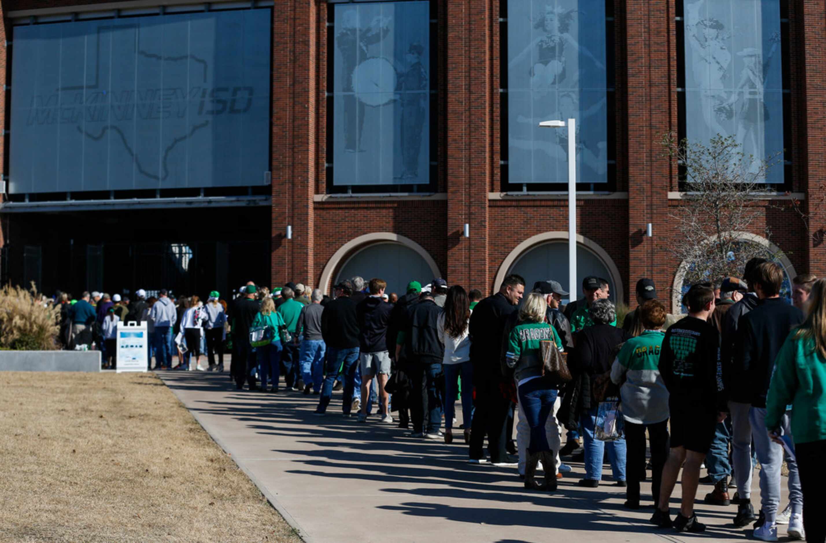 Southlake Carroll fans line up to enter the stadium prior to  a Class 6A Division I Region I...