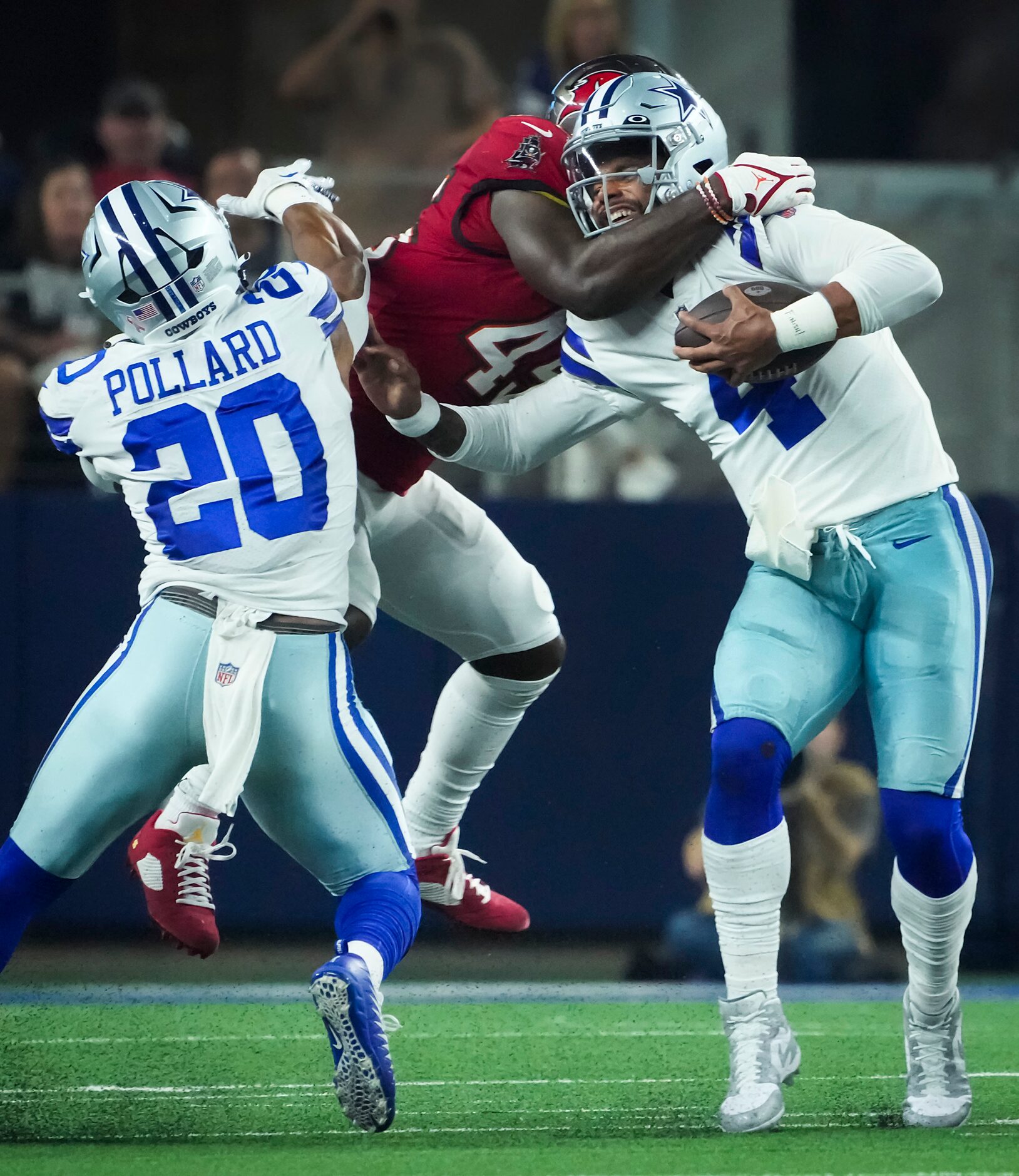 Dallas Cowboys quarterback Dak Prescott (4) is sacked by Tampa Bay Buccaneers linebacker...