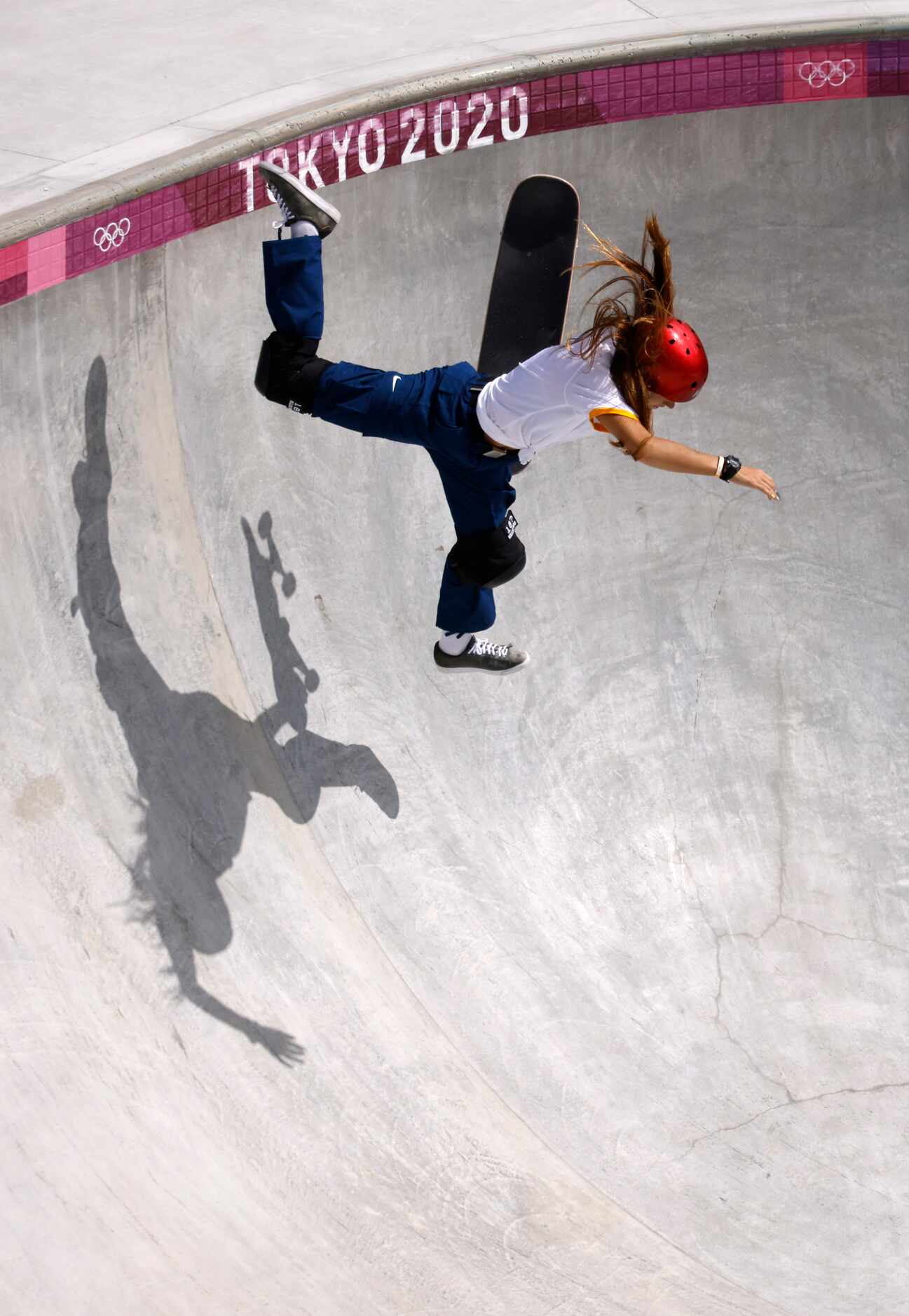 Brazil’s Dora Varella slips as she competes during the women’s skateboarding prelims at the...