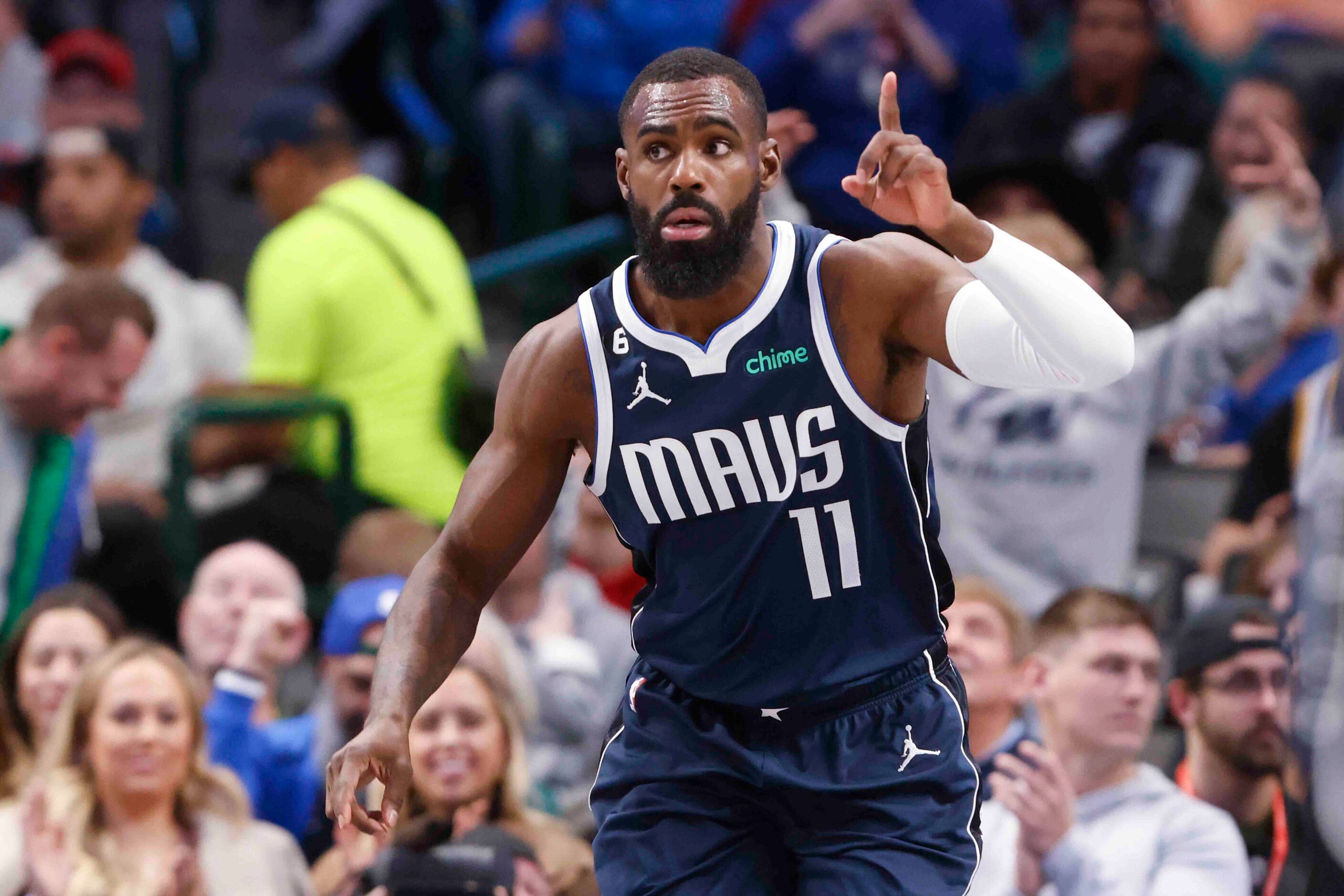 Dallas Mavericks forward Tim Hardaway Jr. (11) cheers to during the second half of an NBA...