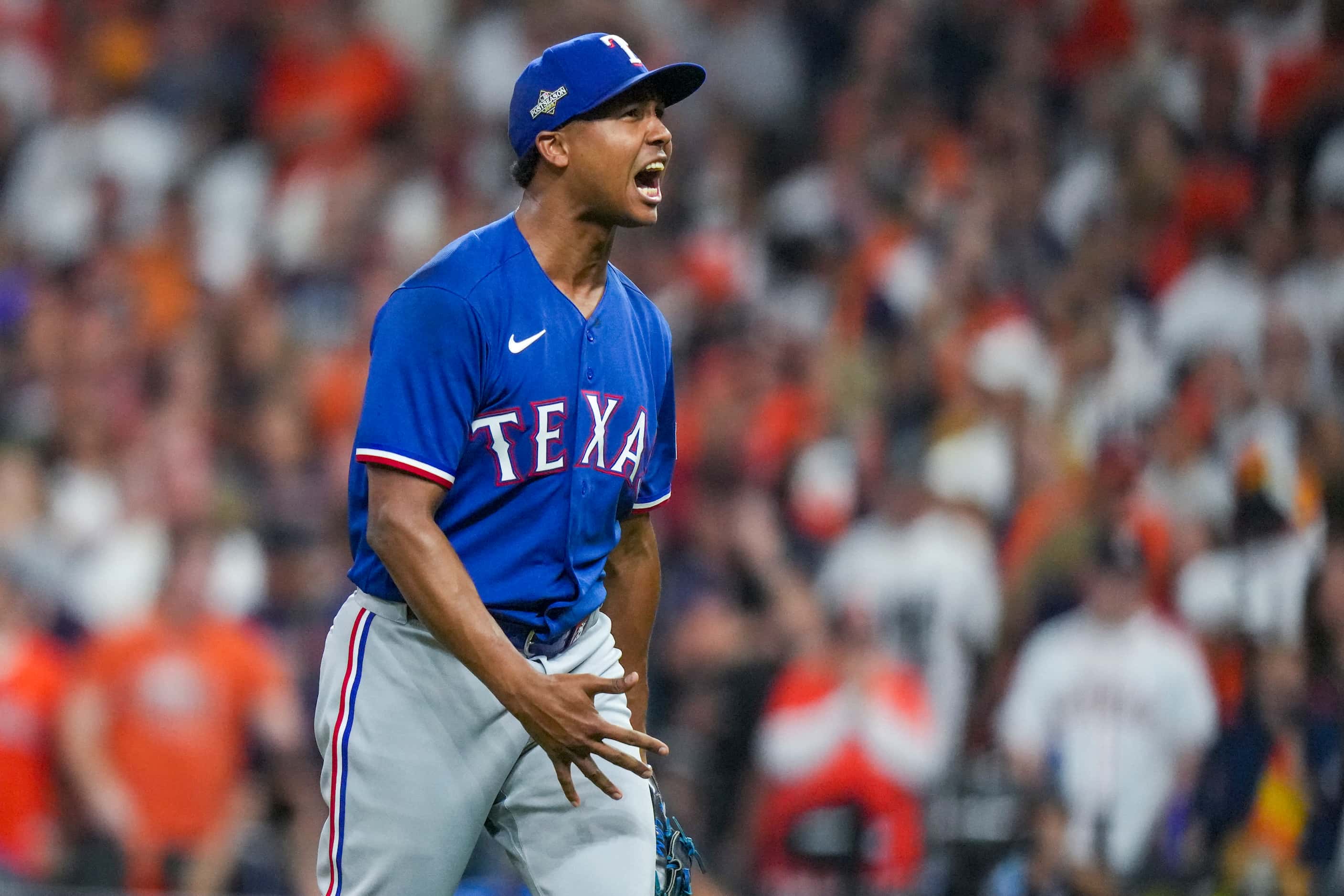 Texas Rangers relief pitcher Jose Leclerc celebrates after striking out Houston Astros pinch...