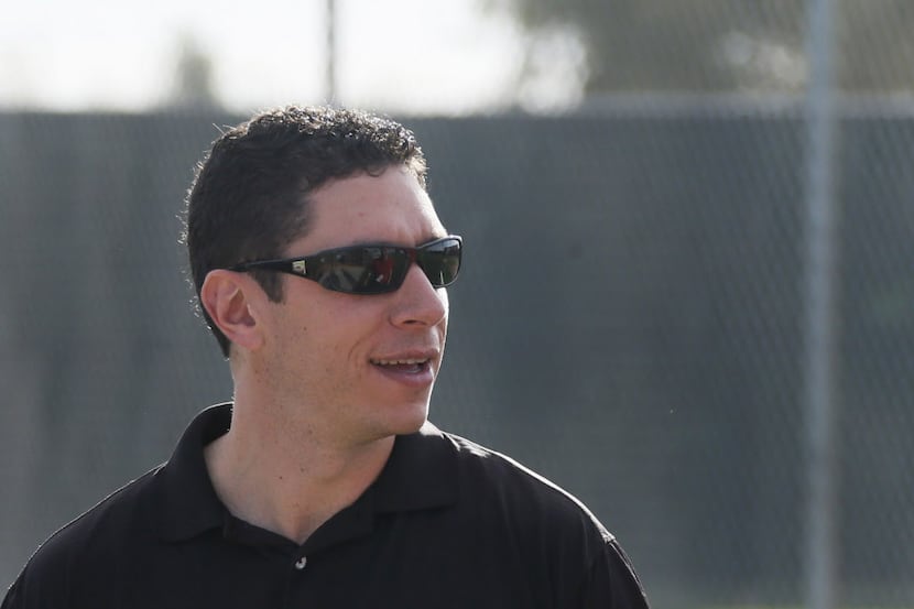 Texas General Manager Jon Daniels watches as pitchers and catchers report to Texas Rangers...